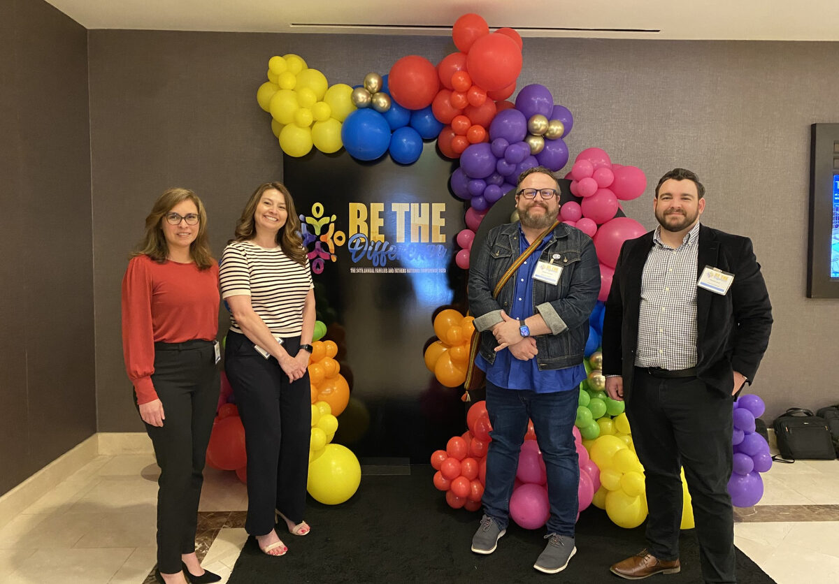 OC Fatherhood Coalition members attend the National Fathers and Families Conference in L.A. on April 23. First 5 OC Program Officer Andrew Montejo is pictured with three staff members from Child Support Services.
